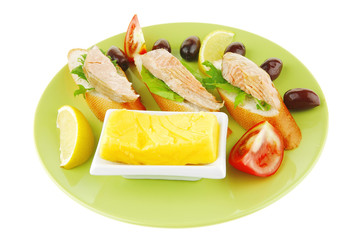 fried salmon chunks on baguette