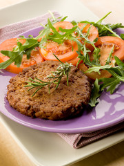 soy steak with arugua and tomatoes salad