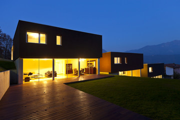 Three modern houses, outdoor by night