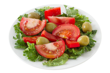 vegetable salad with olives on the plate