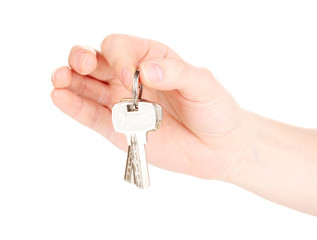 Keys in hand isolated on white