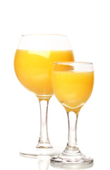 Tropical juices in glasses isolated on white