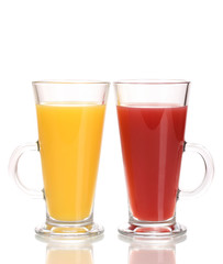 Tropical juices in glasses isolated on white
