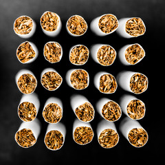 Abstract cigarettes background. Small DOF