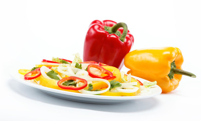 Healthy food. Fresh vegetables and salad on a white background.
