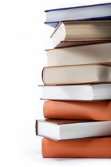 A stack of books on a white background.