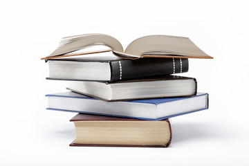 A stack of books on a white background.