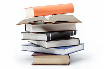 A stack of books on a white background.