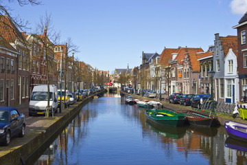 Traditional dutch houses on the canal in Alkmaar town, Holland,