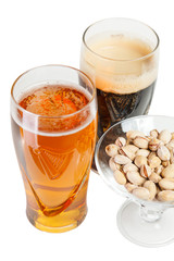 a glass of light and dark beer