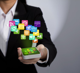 Hand holding a phone show colorful button streaming