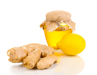Ginger with lemon and honey isolated on white