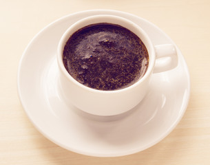 white cup of coffee on the table
