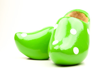 Green wooden shoes with white dots