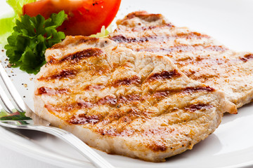 Grilled steaks and vegetables