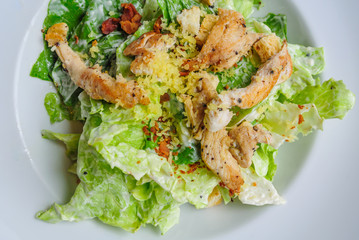 roast chicken salad in white plate