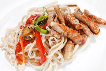 meat with noodles and vegetables