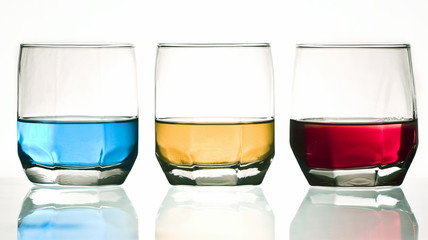 Colorful drinks on white background