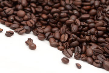 Roasted coffee beans catty-corner isolated