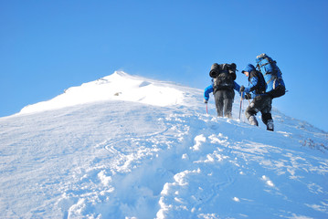Hike in a winter mountain