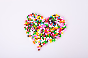 Play beads in the shape of a heart