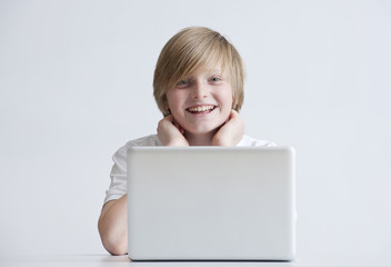 Happy boy with laptop