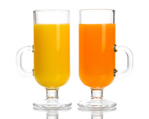 Tropical juices in glasses isolated on white