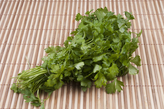 Dozens of persley on bamboo background