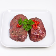 Marinated beef steaks with parsley