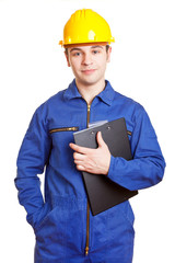Arbeiter mit Blaumann und Helm