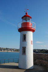 Lighthouse on a blue sky