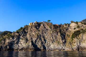 Fototapeta na wymiar Traditional Village of Corniglia on Top of the Hill in Cinque Te