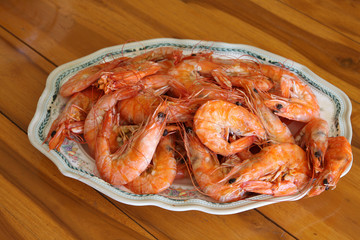 Steamed shrimp in dish on the table