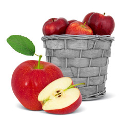 Basket with red apples and slice isolated on white