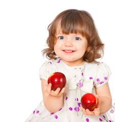 Fototapeta na wymiar portrait of a little girl eating apples