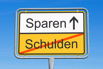 Fototapeta premium Schulden und Sparen