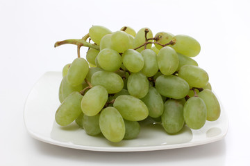 Grapes on white plate