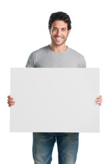 Smiling guy with sign