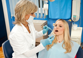 woman dentist at work