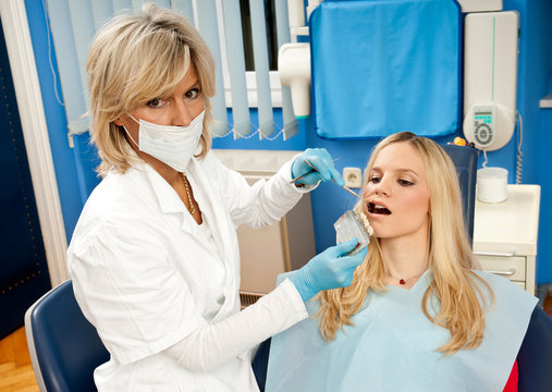 woman dentist at work
