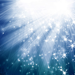 blue background with rays and stars