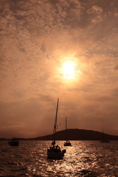 Fototapeta Yachts in the sunset