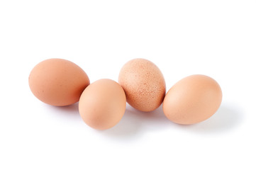 Food on white: brown eggs