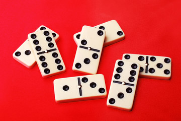 few domino on red background