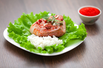fried meat with rice and vegetables