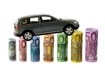 Auto und Geldscheine als Diagramm