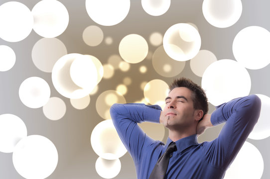 Dreaming Businessman in front of Bubbles