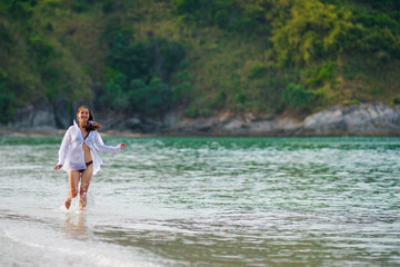 Woman running in the sea