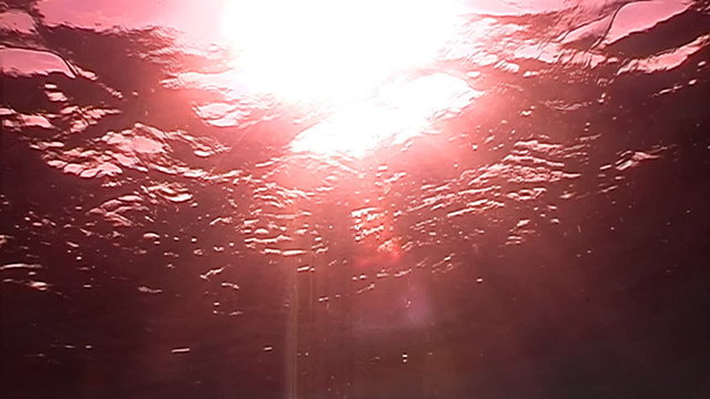 Red underwater sunset