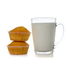 Glass of milk and cupcakes